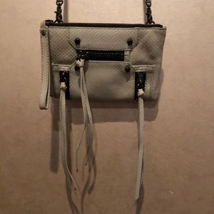 Botkier mini snake wristlet is crossbody